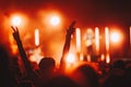 Cheering crowd with hands in air at music festival Royalty Free Stock Photo