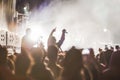 Cheering Crowd at music festival, teens having fun