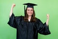 Cheering german female graduate student with academic dress and cap Royalty Free Stock Photo