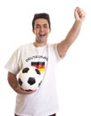 Cheering german soccer fan with football