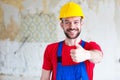 Cheering handyman after a job well done Royalty Free Stock Photo