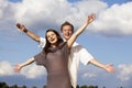 Cheering happy teenage couple