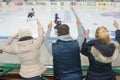 Cheering at hockey game