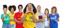 Cheering soccer fan from Brazil with supporters from Spain Ghana Mexico Qatar Argentina and France Royalty Free Stock Photo