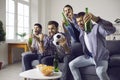 TV soccer game fans watching match cheering and loudly screaming at home