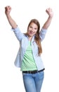 Cheering woman with blond hair in casual clothes Royalty Free Stock Photo