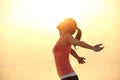 Cheering woman open arms on beach Royalty Free Stock Photo