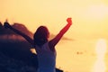 Cheering woman open arms on beach Royalty Free Stock Photo