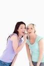 Cheering Women singing karaoke Royalty Free Stock Photo