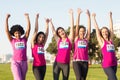 Cheering women supporting breast cancer marathon