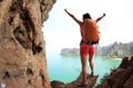 Cheering young asian woman hiker open arms Royalty Free Stock Photo