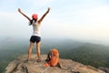 Cheering young asian woman hiker open arms Royalty Free Stock Photo