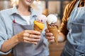 Cheering with yummy ice creams indoors