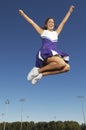 Cheerleader jumping Royalty Free Stock Photo