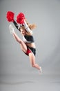 Cheerleader Jumping In Studio