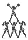 Cheerleader pyramid formation team stunt with top flyer raised high Royalty Free Stock Photo