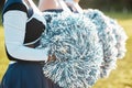 Cheerleader team, sports and hands with pompom for dance, performance and motivation for game. Teamwork, dancer and