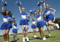 Cheerleaders With Pompoms Cheering On Field Royalty Free Stock Photo