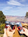 Cheers with Beers Overlooking a Canyon on a Bright Summer Day