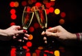 Cheers! Couple cheering with champagne flutes Royalty Free Stock Photo