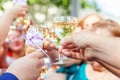 Cheers. Group of people drinking and toasting in restaurant. Hands holding glasses of champagne and wine making toast. Christmas Royalty Free Stock Photo