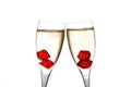 Cheers, red dice in two champagne flutes with gold bubbles Royalty Free Stock Photo