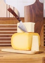 Cheese Aperitif White Cheddar Yellow Gouda Walnut Maple Wood Chopping Block Royalty Free Stock Photo