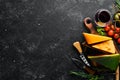 Cheese. Assortment of cheese and snacks on black stone background. Top view. Royalty Free Stock Photo