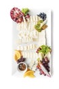 Cheese assortment on a white plate