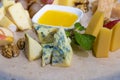 Cheese assorty on table with butter. Horizontal Royalty Free Stock Photo