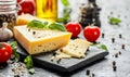 Cheese on black board with spices on rustic background Royalty Free Stock Photo