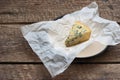 Cheese with a blue mold on the paper Royalty Free Stock Photo