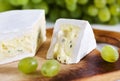 Cheese with blue mould and grape Royalty Free Stock Photo