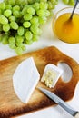 Cheese with blue mould, honey and grape Royalty Free Stock Photo