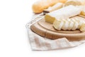 Cheese on board with cloth and knife Royalty Free Stock Photo