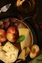 cheese board and fresh fruit grapes Royalty Free Stock Photo
