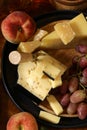cheese board and fresh fruit grapes Royalty Free Stock Photo
