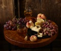 cheese board and fresh fruit grapes Royalty Free Stock Photo