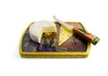 Cheese on a board with knife Royalty Free Stock Photo