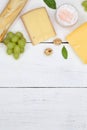 Cheese board platter plate Swiss bread Camembert copyspace portrait format top view Royalty Free Stock Photo