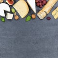 Cheese board platter plate Swiss bread Camembert copyspace square slate top view Royalty Free Stock Photo