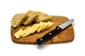 Cheese and bread on bamboo cutting board