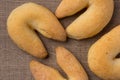 Cheese bread known as Chipa in Brazil, shaped like a horseshoe.