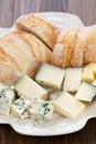 Cheese with bread on white dish Royalty Free Stock Photo