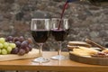 Cheese, grapes, bread, wine on a table Royalty Free Stock Photo