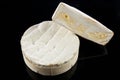 Cheese brie isolated on black background. camambert food Royalty Free Stock Photo