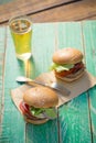 Cheese burger with grilled meat, cheese, tomato, on craft paper Royalty Free Stock Photo