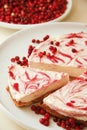 Cheese cake with cream and rasberry on white platter Royalty Free Stock Photo