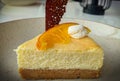 Cheese cake with orange slice on top