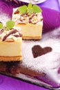 Cheese cake on purple plate Royalty Free Stock Photo